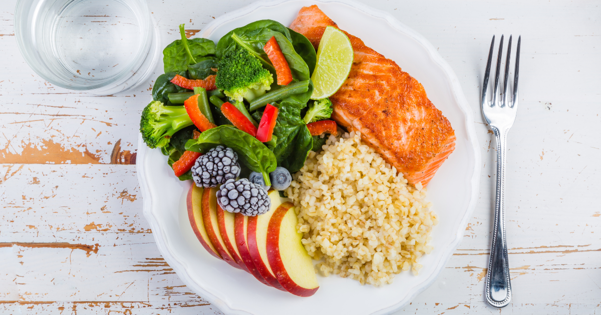 A plate with vegetables, protein, and a small serving of whole grains